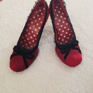 Red lace and satin pumps